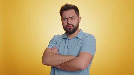 cheerful funny bully caucasian man showing tongue making silly faces fooling around joking teasing