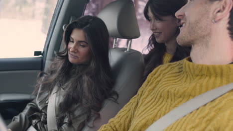 husband and wife sitting in the front seats of a car 5