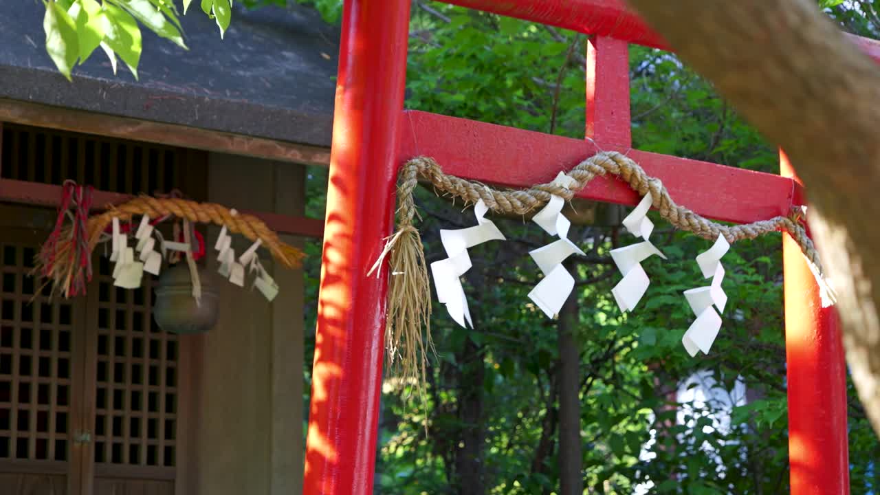 Japanese Torii Gate with Shimenawa and Shrine Building