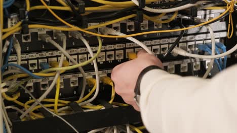 technician configures the network equipment in the server room