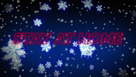 animation of stay at home text with winter scenery and snow falling on blue background