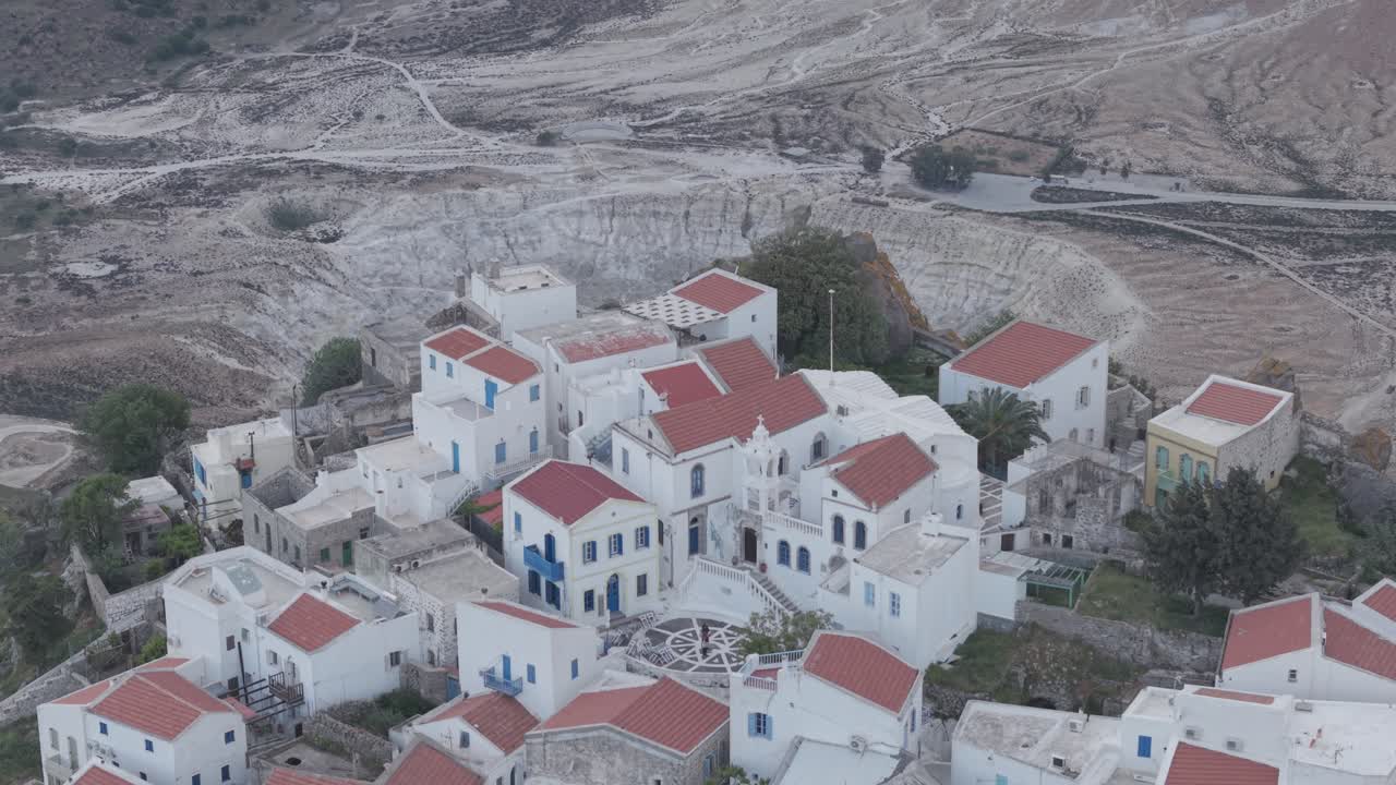 Bird's eye view revealing the beauty of Panoramic view of the active volcano and the village of Nikia in Nisyros island, Greece. D-log M