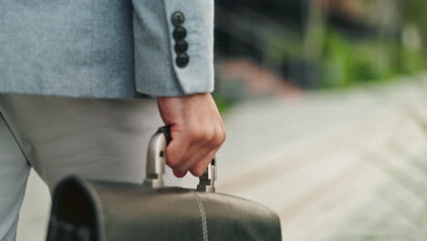 businessman walking with briefcase