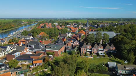 drone establishing shot of historic north holland village ilpendam in rural netherlands