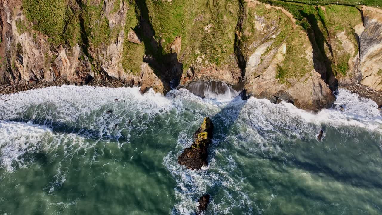 Wild Nature Ireland waves from Atlantic Storm eroded fragile sea cliffs coastal erosion Waterford