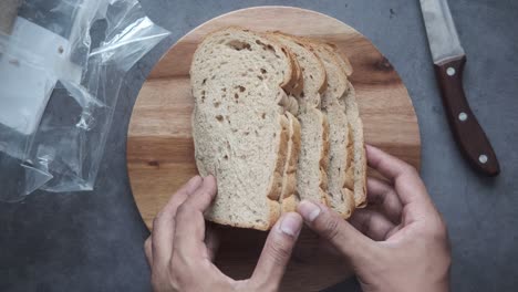 sliced bread on wooden cutting board