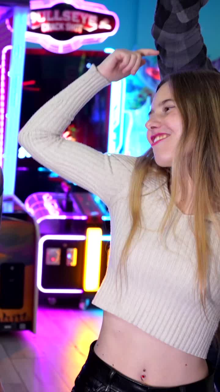 Friends having fun at an arcade