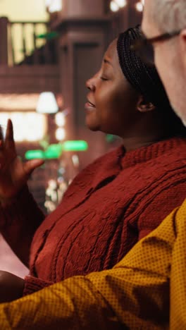 vertical video diverse actors rehearsing dialogue and character expression in a quiet library