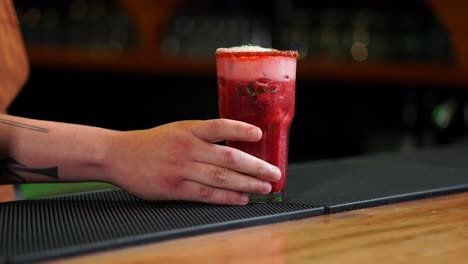 Mexican-strawberry-mojito-daiquiri-margarita-drink-on-glass-overfilled-on-bar-table-mexico-latin-bar-restaurant