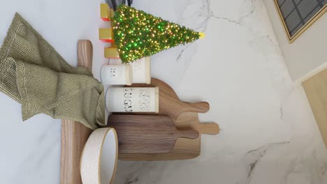 small christmas tree and kitchenware in the corner of a kitchen - 3d render vertical