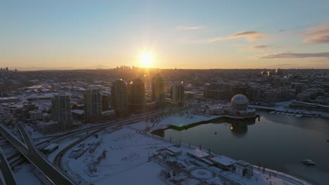 vancouver city canada stunning drone aerial shot with winter snow and sun flares and passing traffic