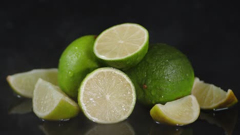 whole and sliced fresh limes with cool steam.