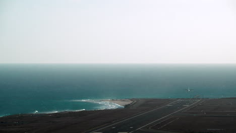 Airplane-flying-on-the-background-of-the-sea