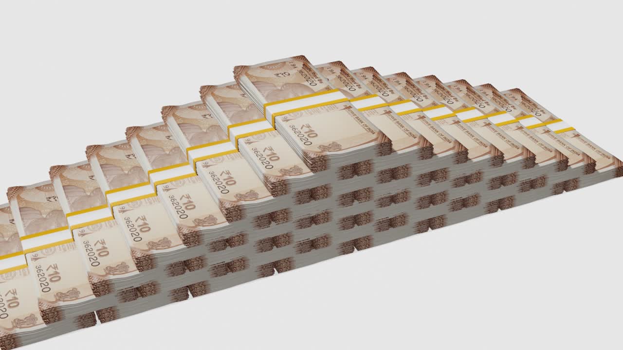 Banyak tumpukan uang. Uang kertas 10 Rupee India.