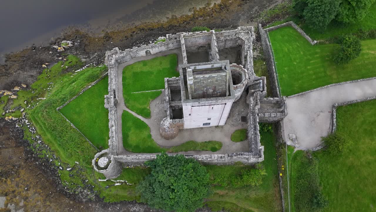 Doe Castle drone close up reveal, Donegal scenery. Ireland heritage, architecture