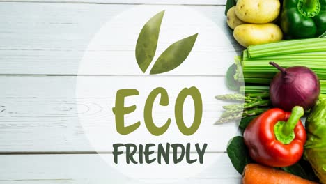 Animation-of-eco-friendly-text-in-green,-over-fresh-vegetables-on-white-wooden-boards