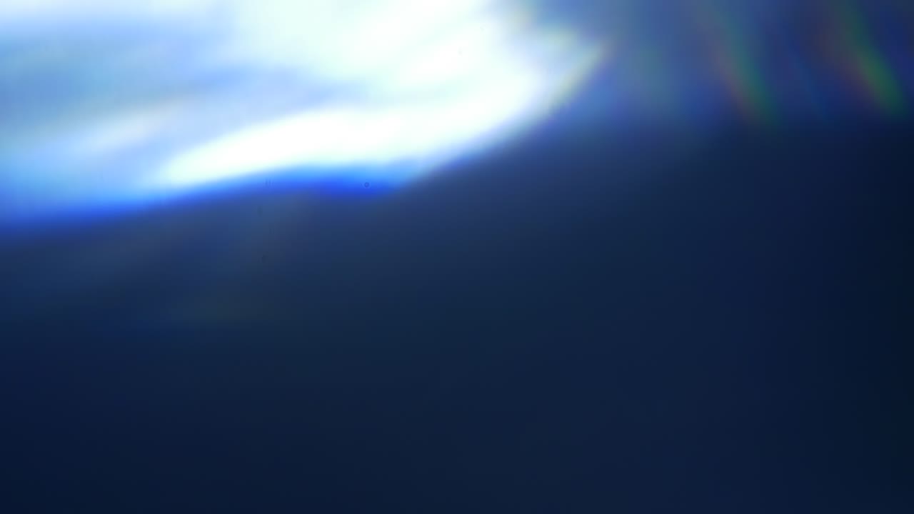 Abstract Moving Light Leaks and Lens Flares Overlay