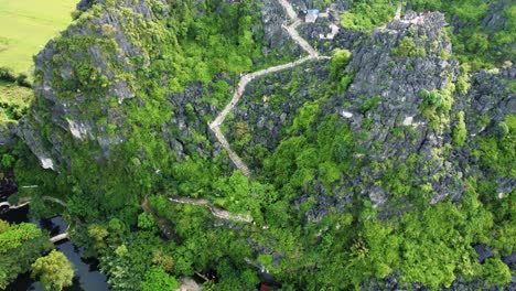 sharp edges of hang mua mountain and a staircase to the top, ninh binh, vietnam