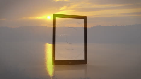 tablet showing circular data animation against serene sunset landscape backdrop
