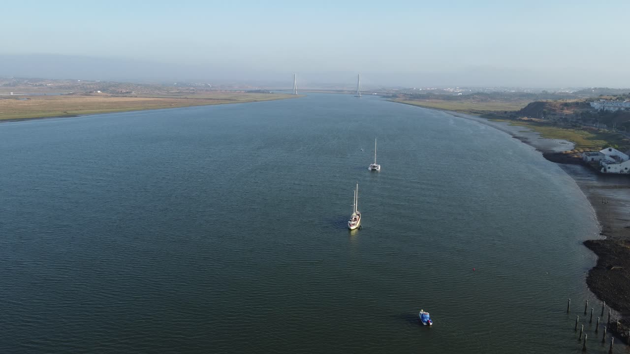 Aerial view of Rio Guadiana, that is the border between Spain and Portugal, with the bridge puente internacional del Guadiana, that connects the two countries