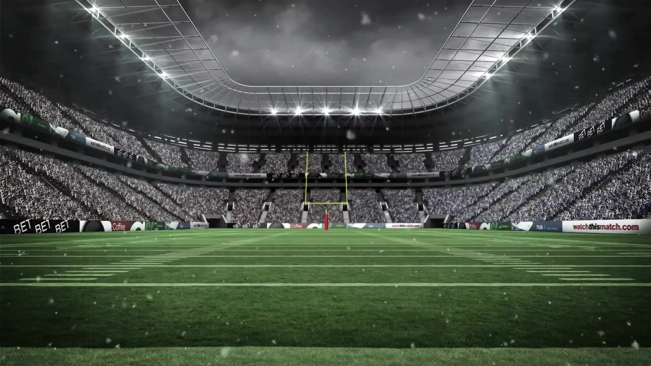 Stadio di football americano vuoto durante una nevicata di notte