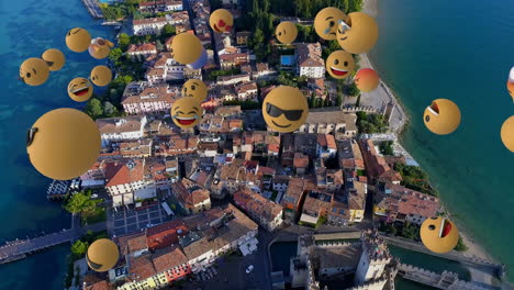 digital composition of multiple face emojis floating against aerial view of cityscape