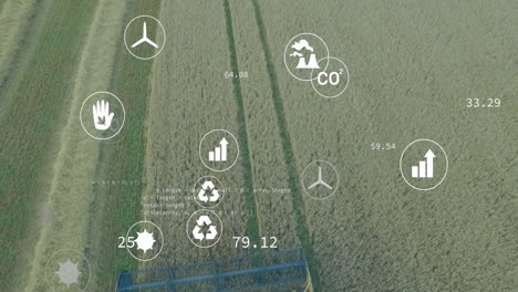 icons representing environmental data and sustainability animation over aerial view of farmland