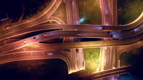 Night-Aerial-view-of-a-freeway-intersection-traffic-trails-in-night-Moscow