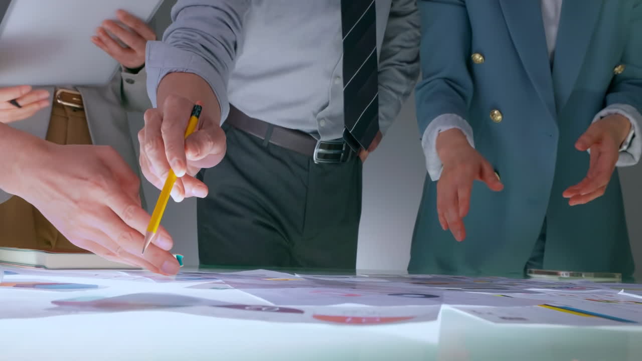 Discussion With Business team including real estate professionals architects and financial experts gathering around a table to discuss and plan a new real estate development project