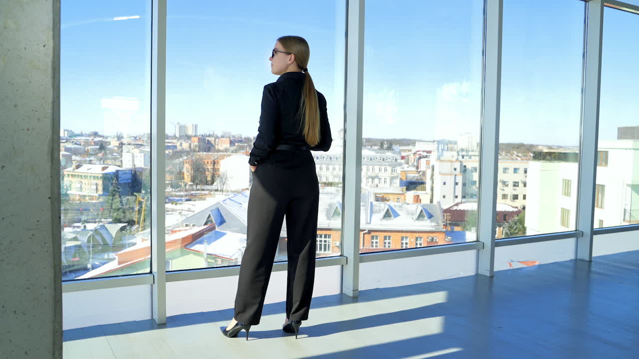 Attractive business woman in office. View of attractive female in corporate office