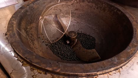 stones added to stove for roasting chestnuts