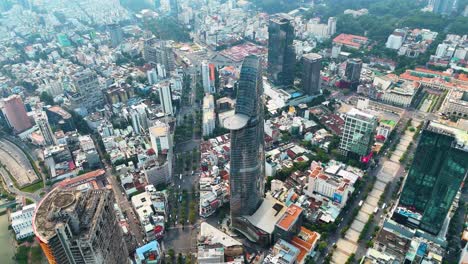 aerial view of ho chi minh city featuring the iconic bitexco financial tower, showcasing modern skyscrapers, dense urban landscape, and city infrastructure in vibrant detail. vietnam, uhd.