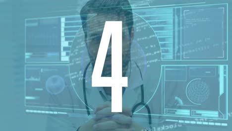 Animation-of-countdown-and-data-processing-over-caucasian-male-doctor