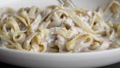 homemade cooked pasta in a plate on table