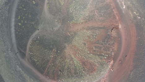 drone flying above crateri silvestri near etna volcano in italy