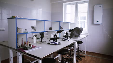 modern science classroom with microscopes