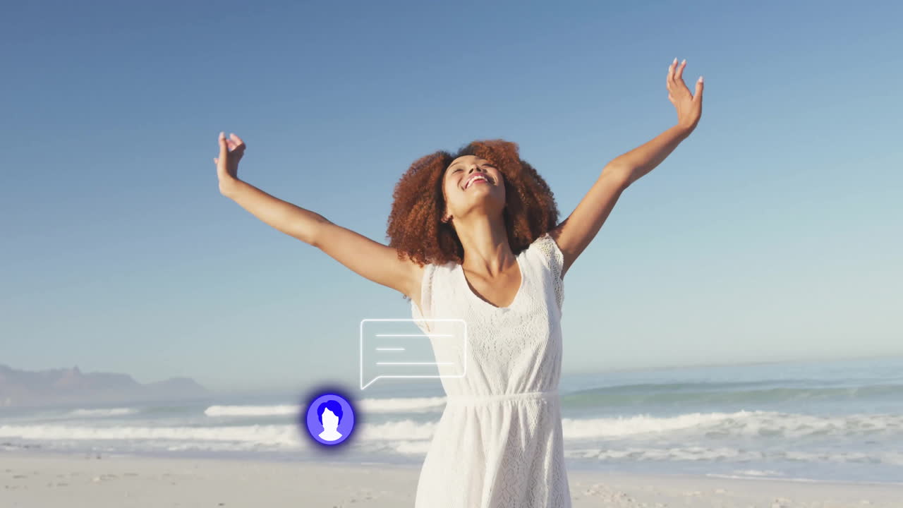 Raising arms on beach, woman with animation of digital notification icon