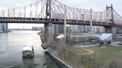 cinematic 4k aerial orbit of queensboro bridge nyc east river