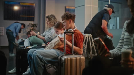 family waiting at airport