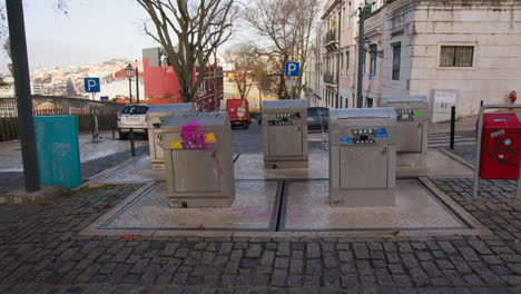 household waste recycling bins on the street in portugal