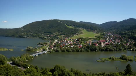 Aerial-view-of-small-mountain-airport-in-Poland-located-on-the-slope-of-Zar-mountain,-above-Zywieckie-lake