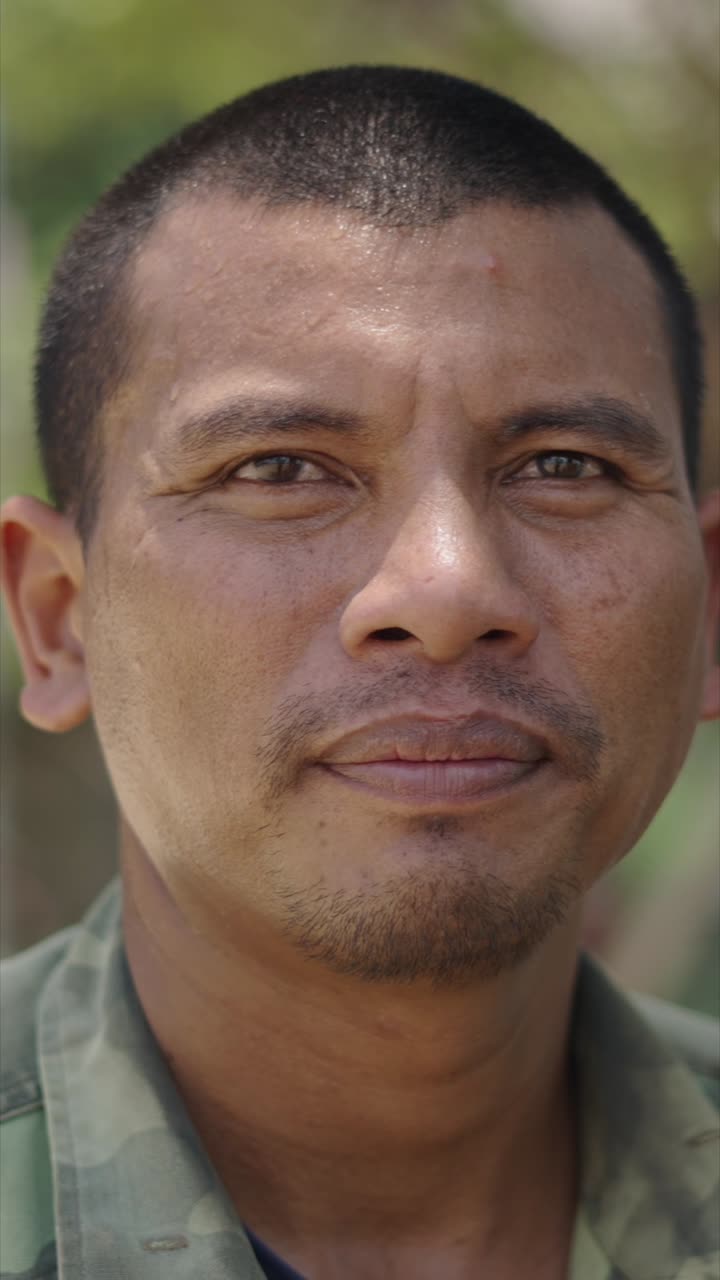 Portrait of a man with sweat on his face