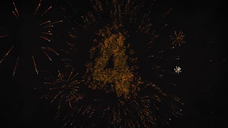 Animation-of-new-year's-eve-countdown-and-fireworks-exploding-on-black-background