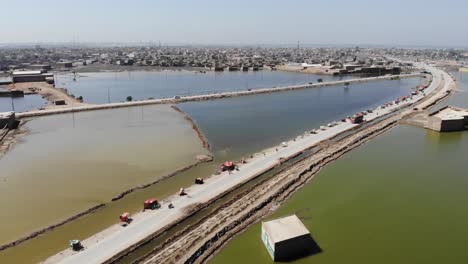 aerial flying over submerged land due to flooding in mehar, sindh