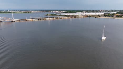 Approaching-aerial-view-of-River-Draw-Bridge-with-New-Construction-in-Perth-Amboy,-NJ