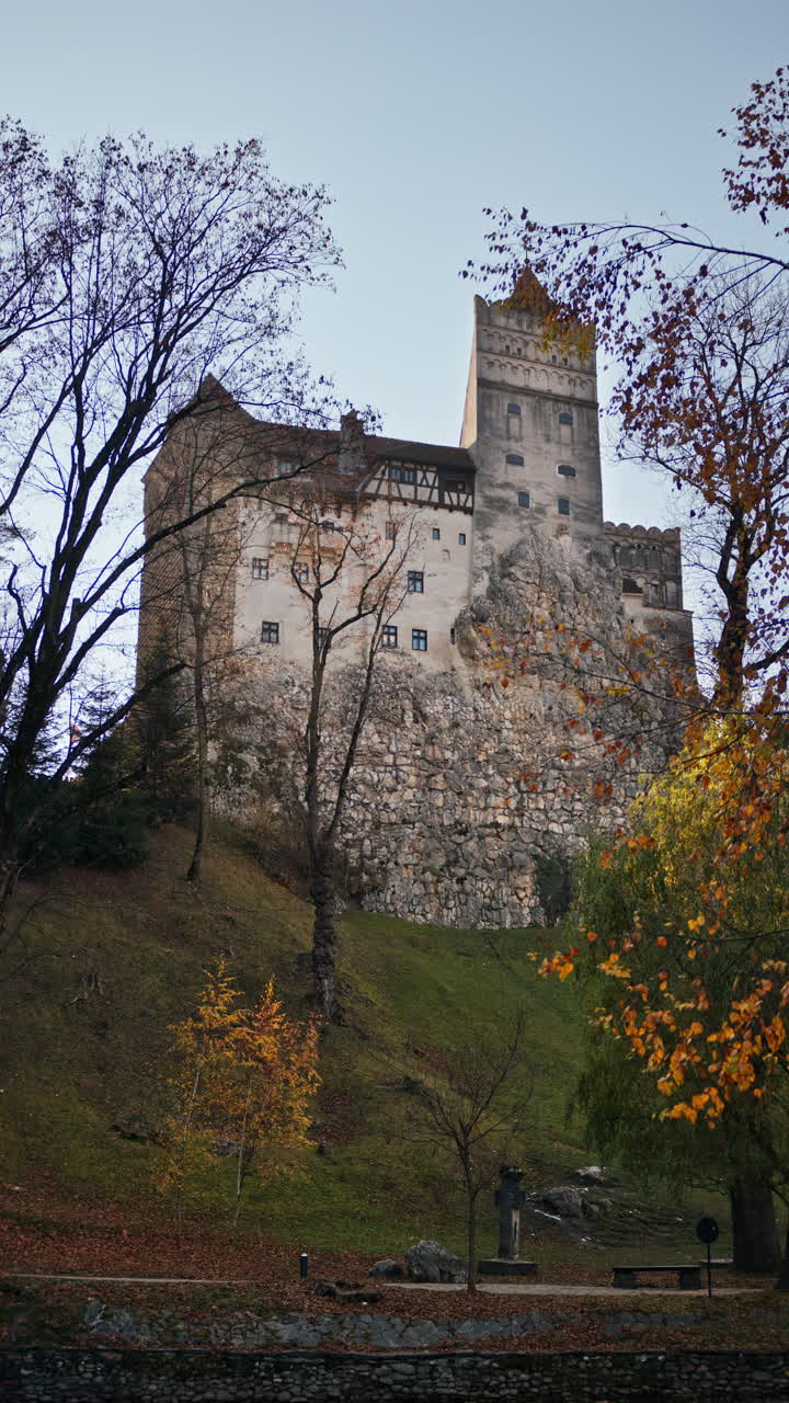 Distant view of the Bran Castle in Bran, Transylvania, Romania. Vertical