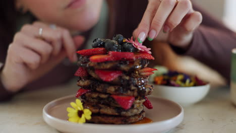 Pancake-stack,-decoration-and-hands
