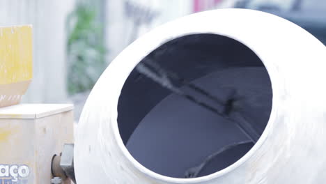 concrete mixer spinning on a construction site