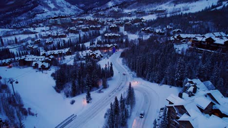 evening drone shot of busy roads in telluride ski village
