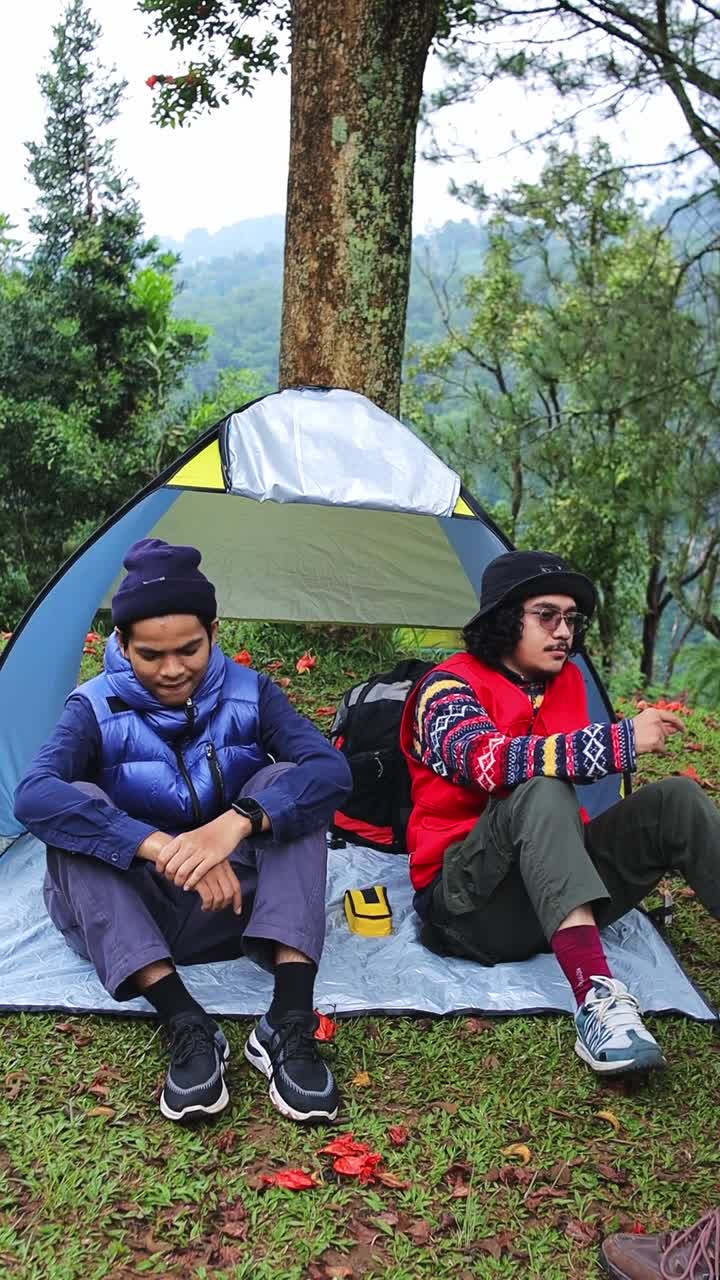Friends camping together enjoying nature's beauty and bonding moments during outdoor
